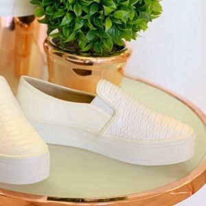White platform sneaker slide